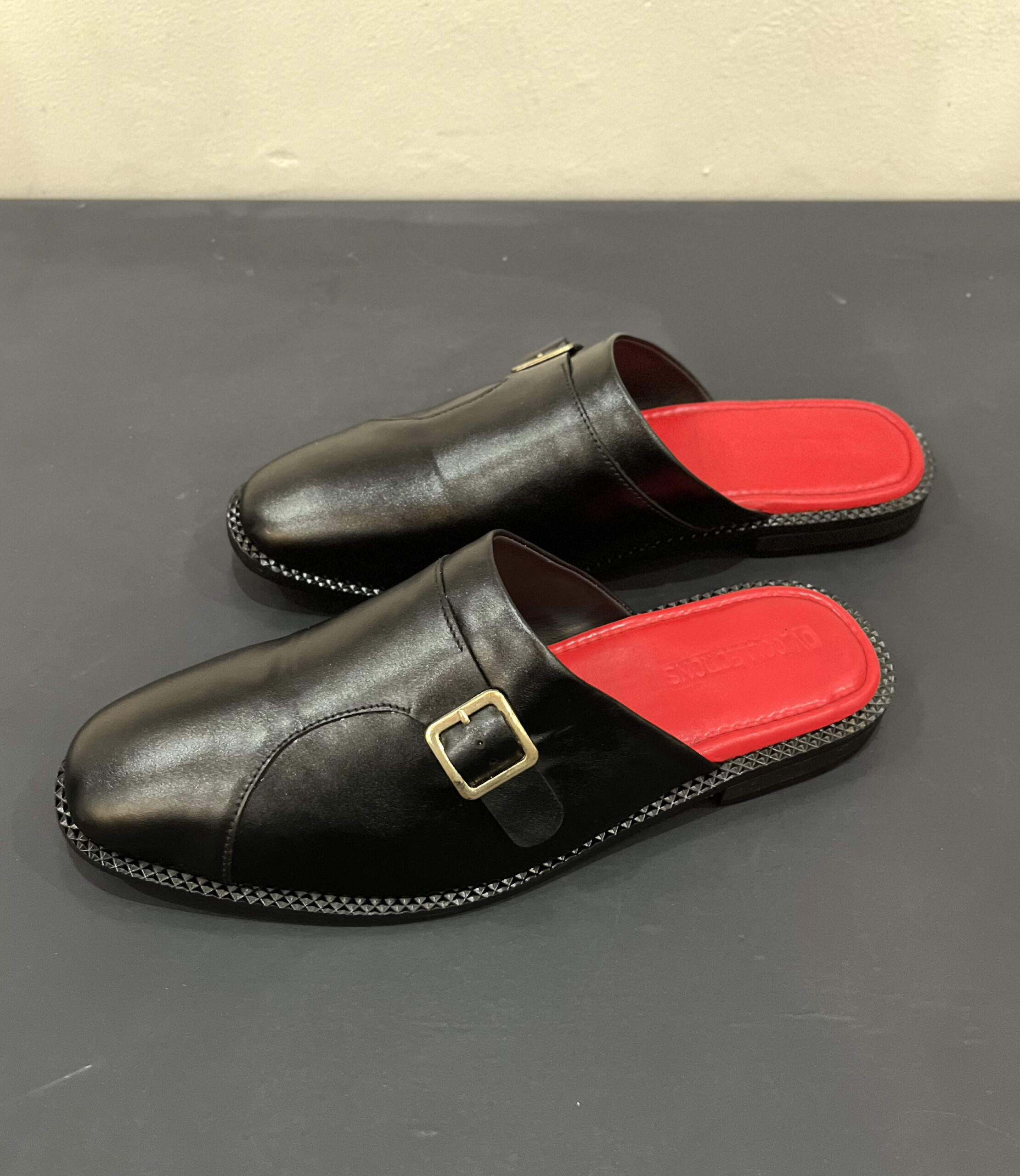 The Covered Buckle Mule With Red Insole